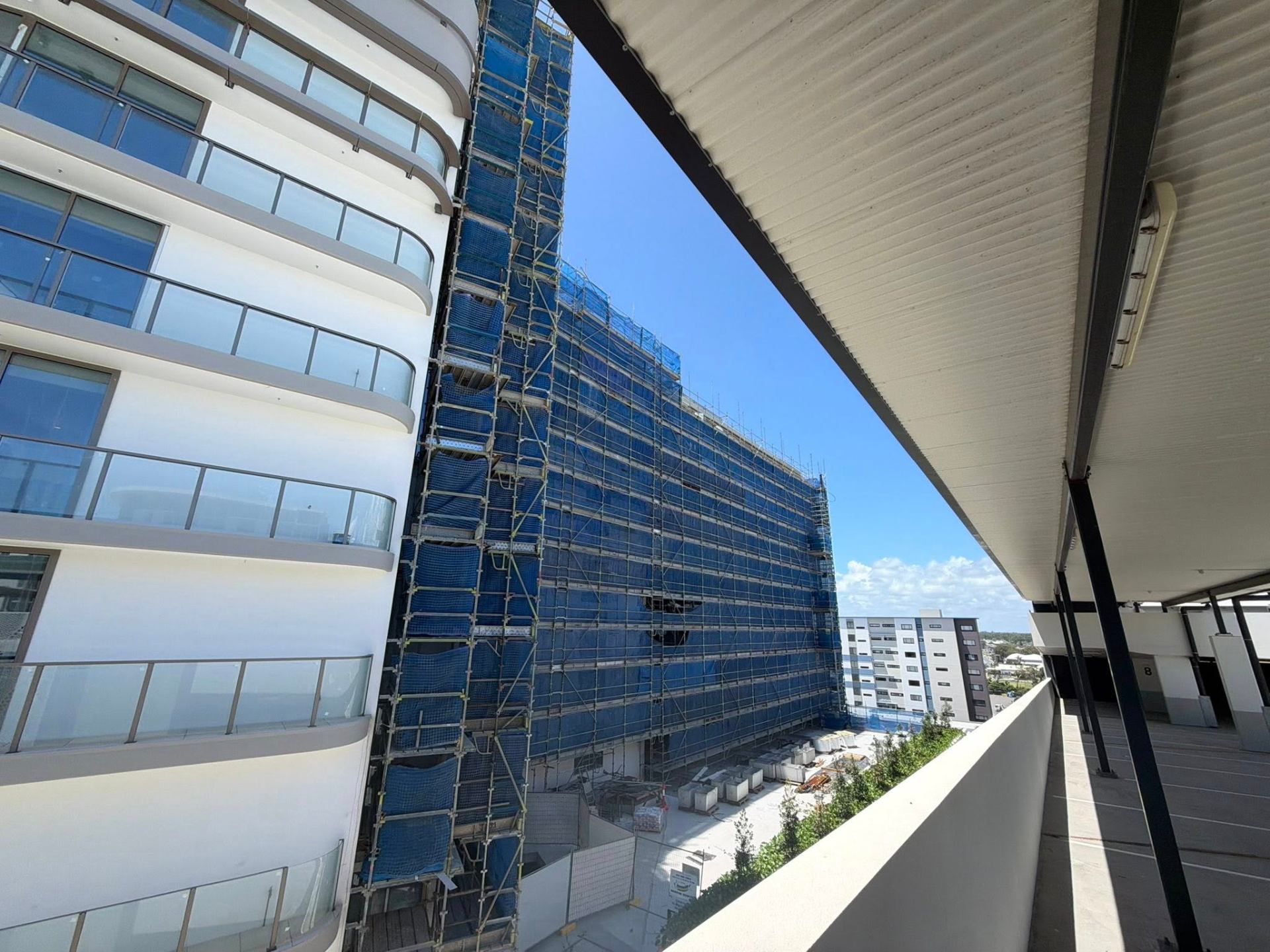 Beachfront tower scaffolding containment Mooloolaba